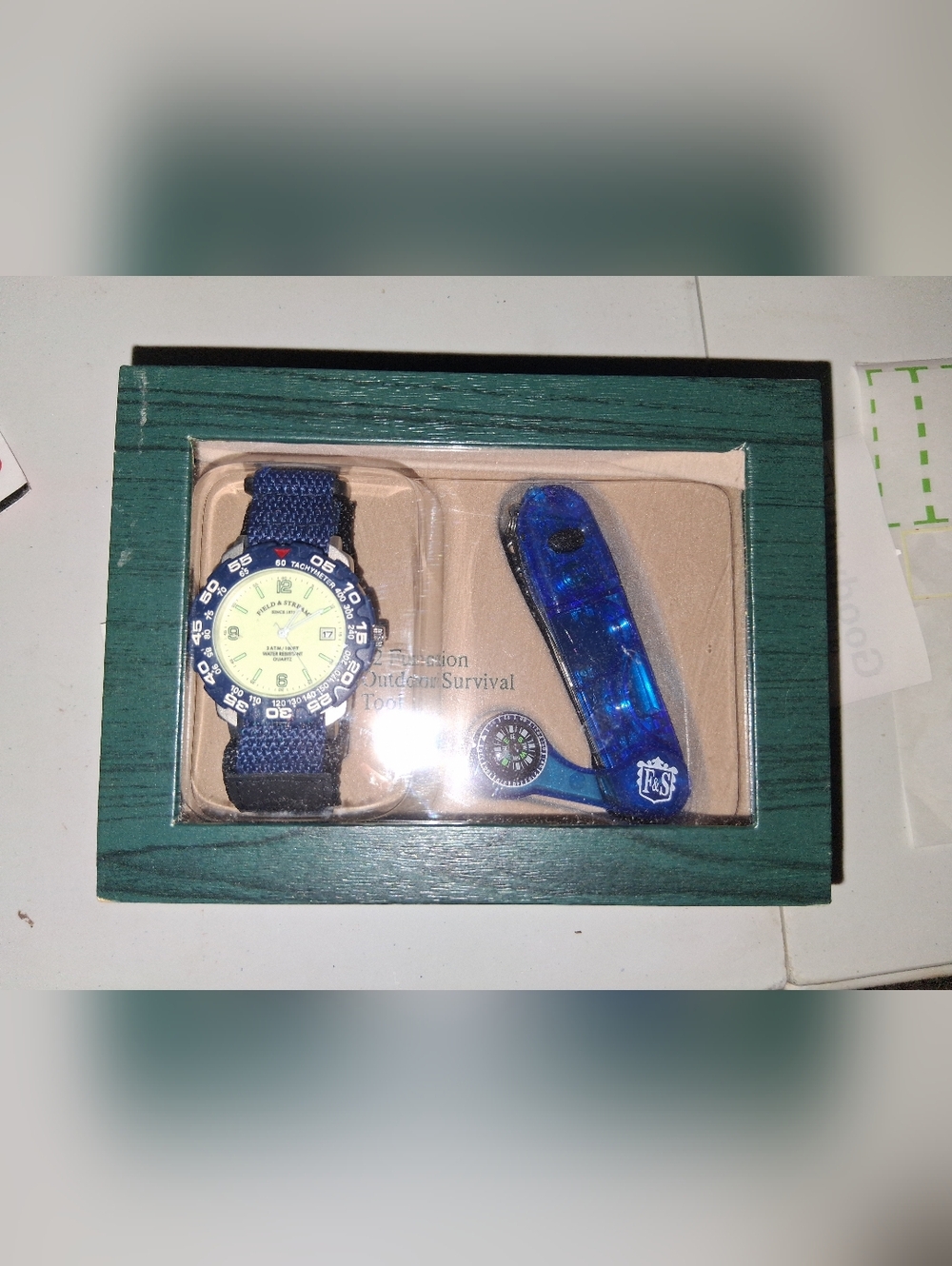 Field & Stream Black Box with White Arch Logo.Watch and Survival Tool.